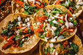 Igotchu Taco seasoning in a jar, featuring a colorful label, ideal for adding flavor to taco dishes and Mexican cuisine.