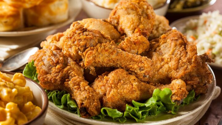 Igotchu Seasonings fried chicken and fish coating mix in a bowl, seasoned with spices for crispy Southern-style fried dishes.