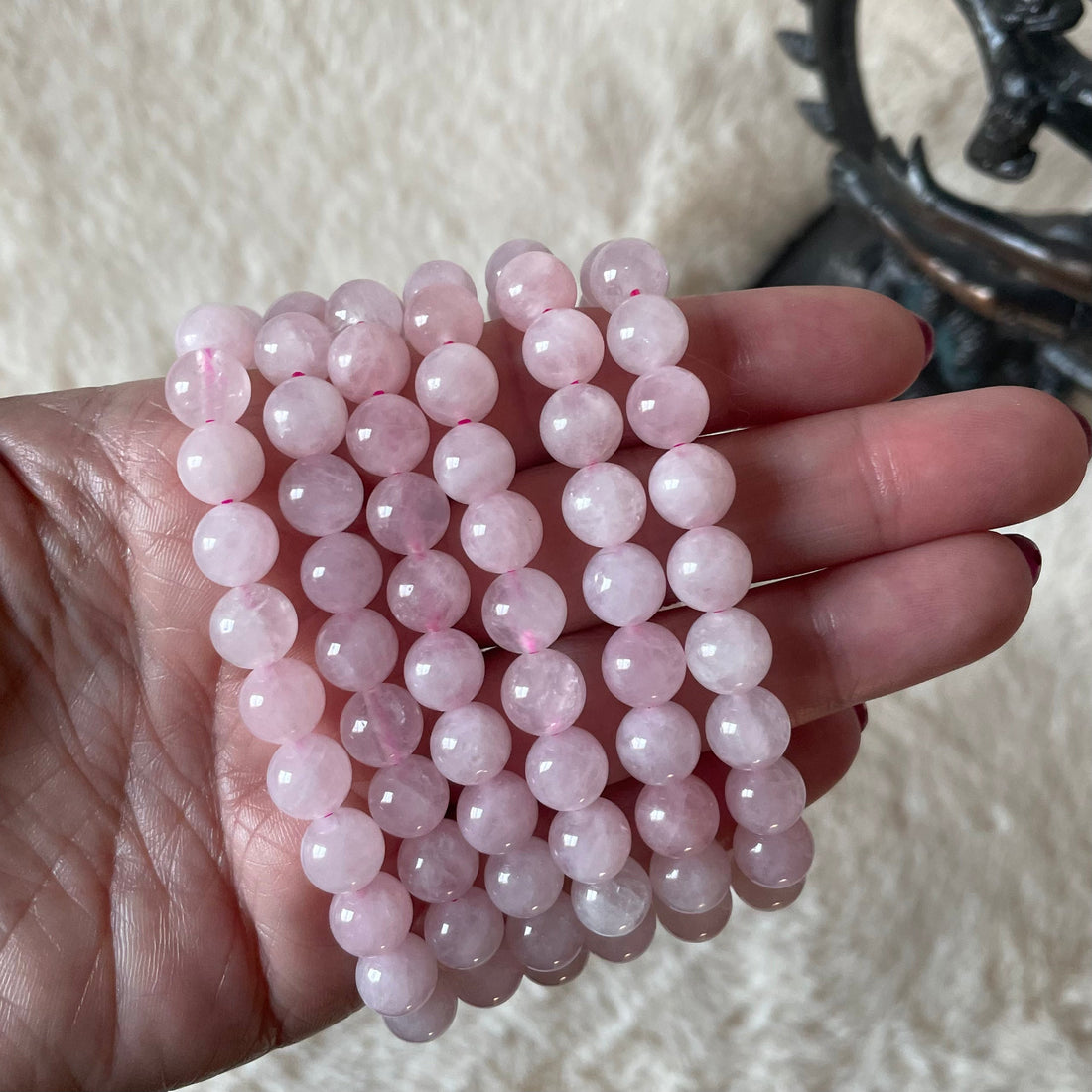 Evermore Everlasting rose quartz stretch bracelet with smooth pink gemstones on elastic band, stylish and elegant jewelry accessory.