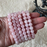 Evermore Everlasting rose quartz stretch bracelet with smooth pink gemstones on elastic band, stylish and elegant jewelry accessory.