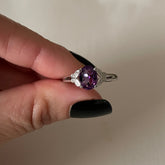 Evermore Everlasting amethyst ring featuring a purple gemstone set in a silver band, showcasing elegant jewelry design.