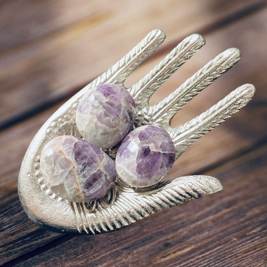 Amethyst palm stone by Evermore Everlasting, smooth purple gemstone with natural crystal patterns, perfect for meditation or display.