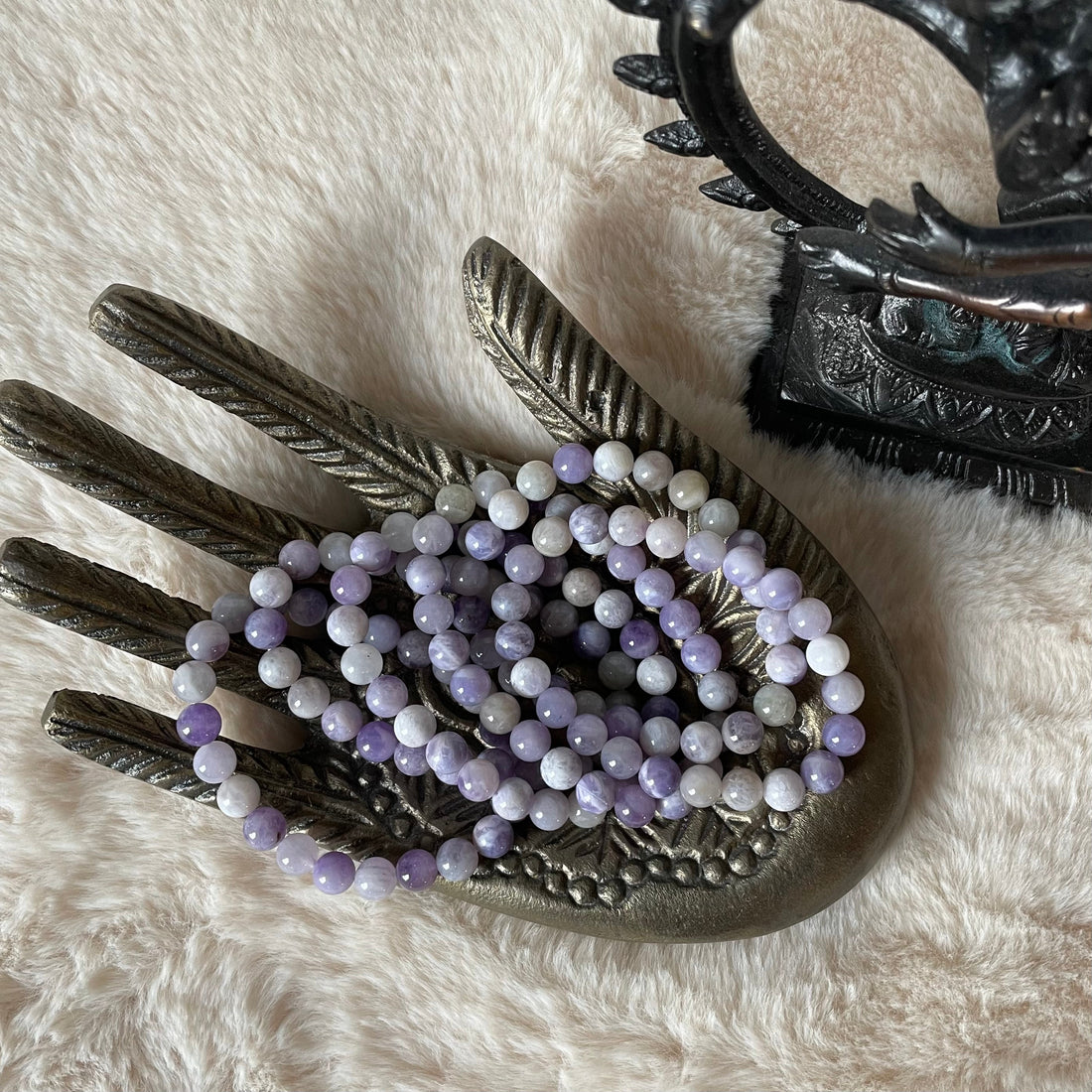 Lavender jade stretch bracelet by Evermore Everlasting featuring smooth, round jade beads on an elastic band.