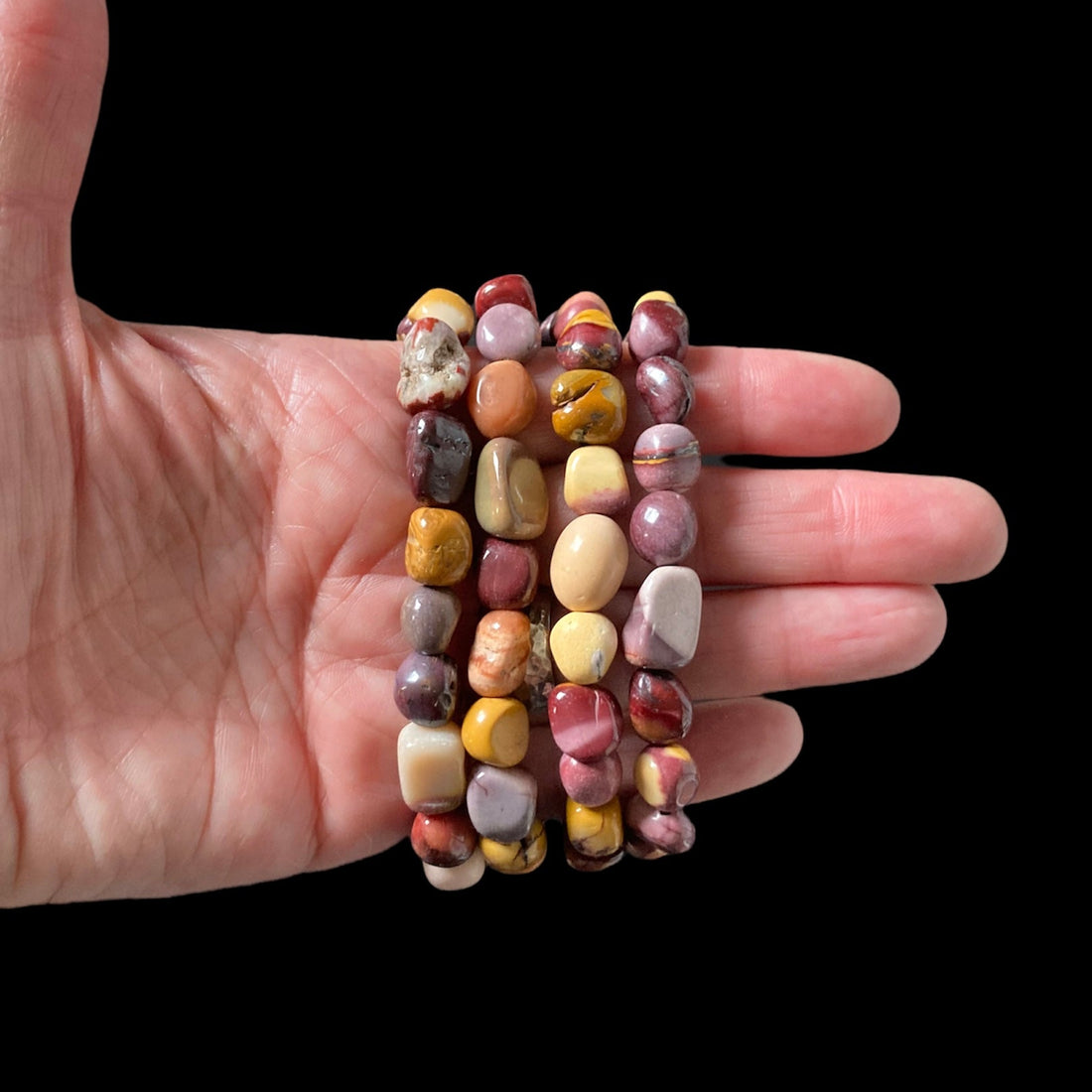 Mookaite stretch bracelet by Evermore Everlasting featuring polished, multicolored jasper beads on elastic cord.