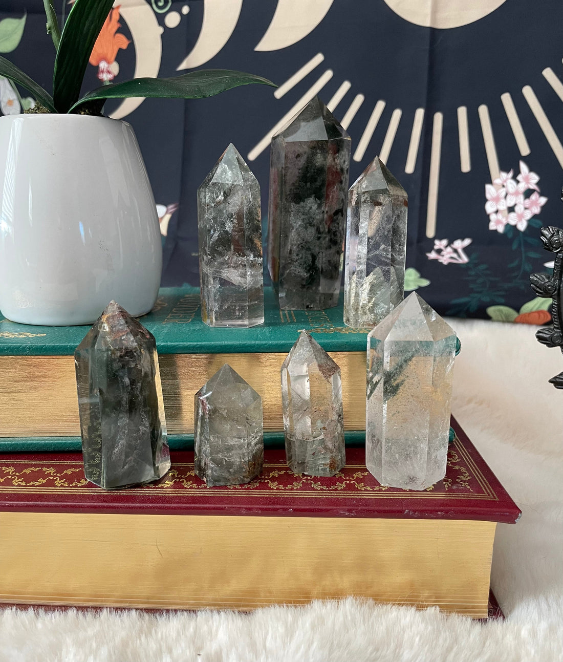 Evermore Everlasting garden quartz crystal towers, natural stone with pointed tips, showcasing clear, shimmering quartz formations.