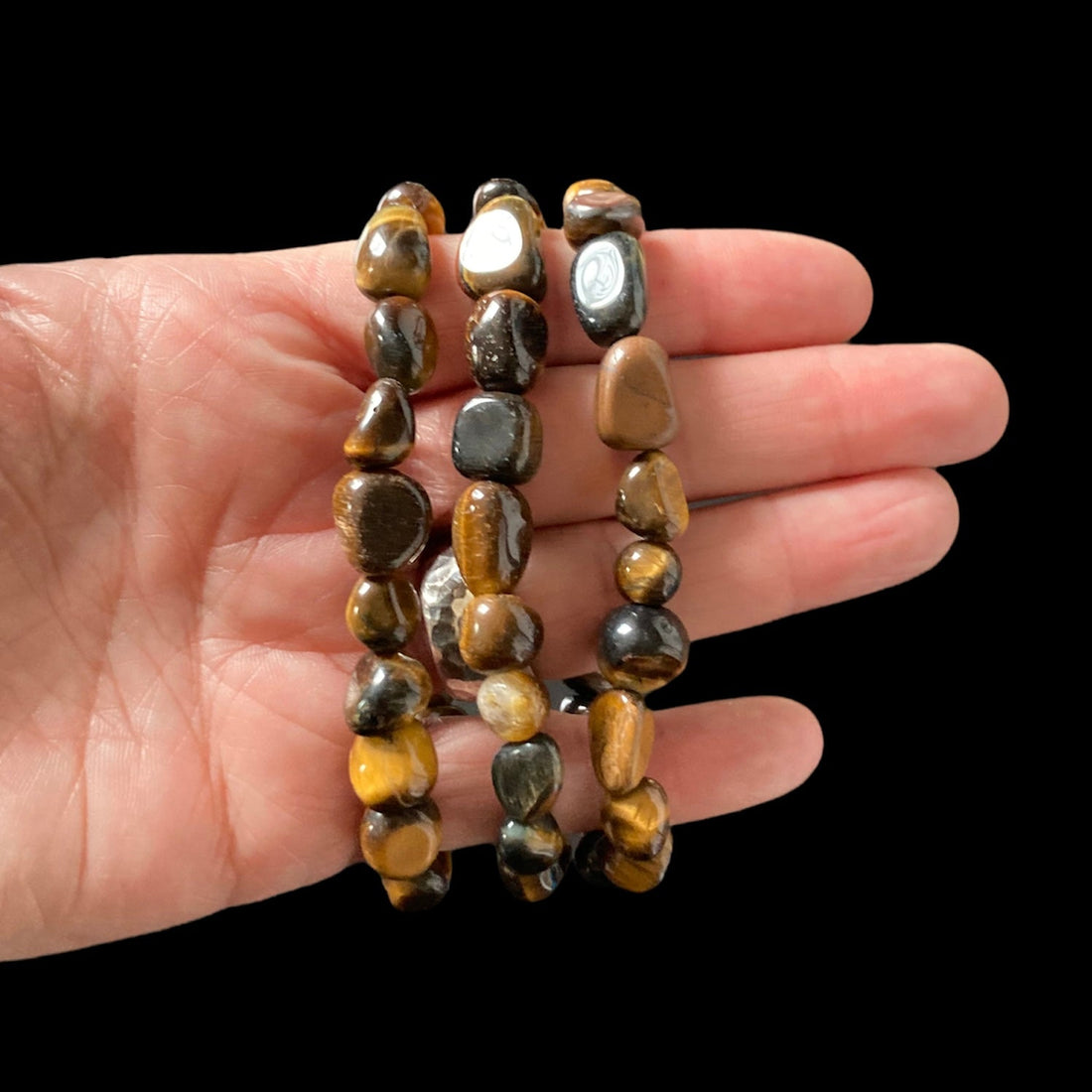 Evermore Everlasting Tiger’s Eye stretch bracelet with smooth, polished beads and elastic band, stylish and gemstone jewelry accessory.