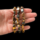 Evermore Everlasting Tiger’s Eye stretch bracelet with smooth, polished beads and elastic band, stylish and gemstone jewelry accessory.
