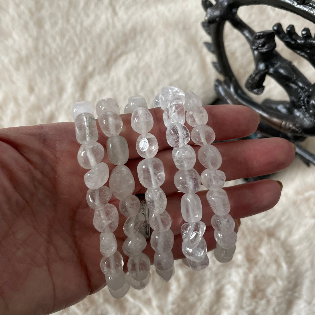 Tumbled clear quartz stretch bracelet by Evermore Everlasting featuring smooth, translucent quartz beads on an elastic band