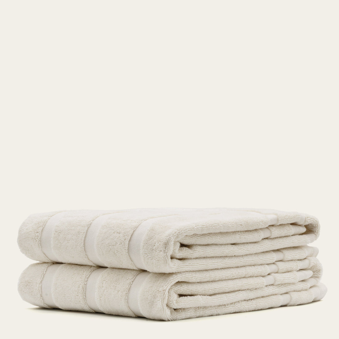 Blue Capri Australian Cotton Bath Towel from Italic, soft and plush, draped on a bathroom hook for home bath use.