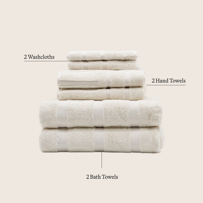 Set of four Italic Australian Cotton Capri bath towels, soft and plush for home use, displayed folded on a neutral background.