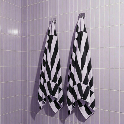 Italic Shadmoor Australian Cotton bath towel draped over a surface, showcasing soft, plush texture and elegant design.