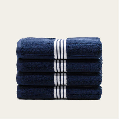 Soft Nautilus Australian Cotton bath towel by Italic, showing plush, white terry cloth with a textured border.