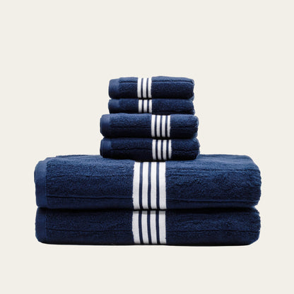 Set of Nautilus Australian Cotton Bath Towels by Italic, plush white towels with a textured weave for luxurious home use.