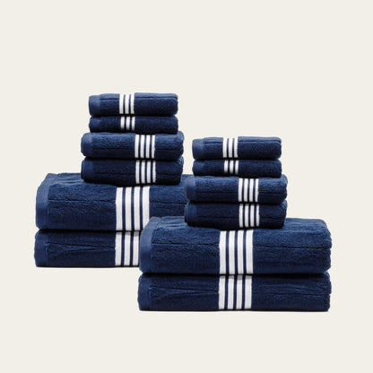 Family using soft Nautilus Australian Cotton Towels from Italic in a bathroom, showcasing plush, absorbent bath towels for home use.