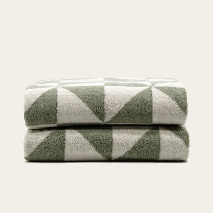 Umbra Australian cotton bath towels in soft white, featuring a plush, absorbent texture for luxurious home bath essentials