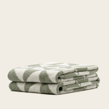 Set of two Umbra Australian Cotton Bath Towels in soft, plush fabric with a clean, modern design for home use.