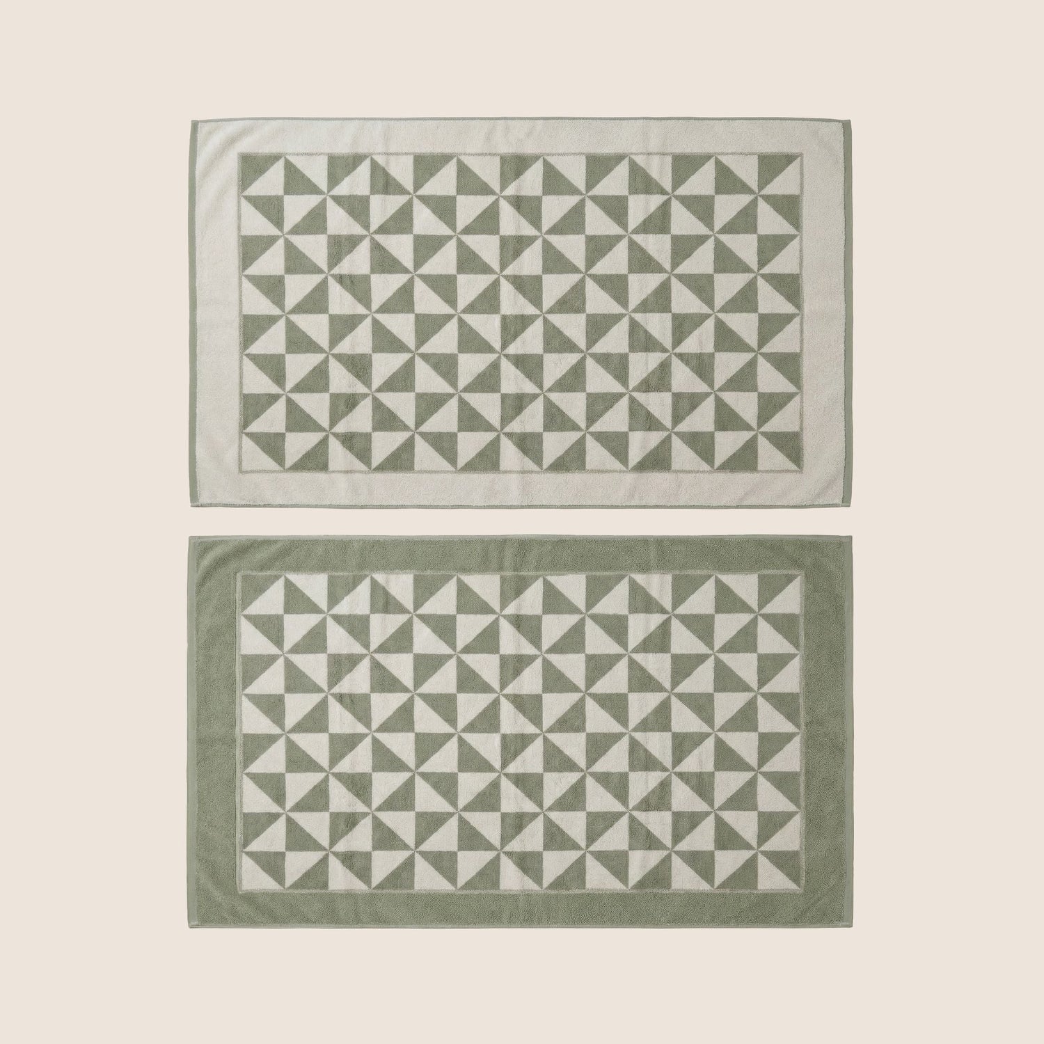 Umbra Australian cotton bath towels by Italic, flatlay image showing soft, plush, white towels perfect for bathroom use.