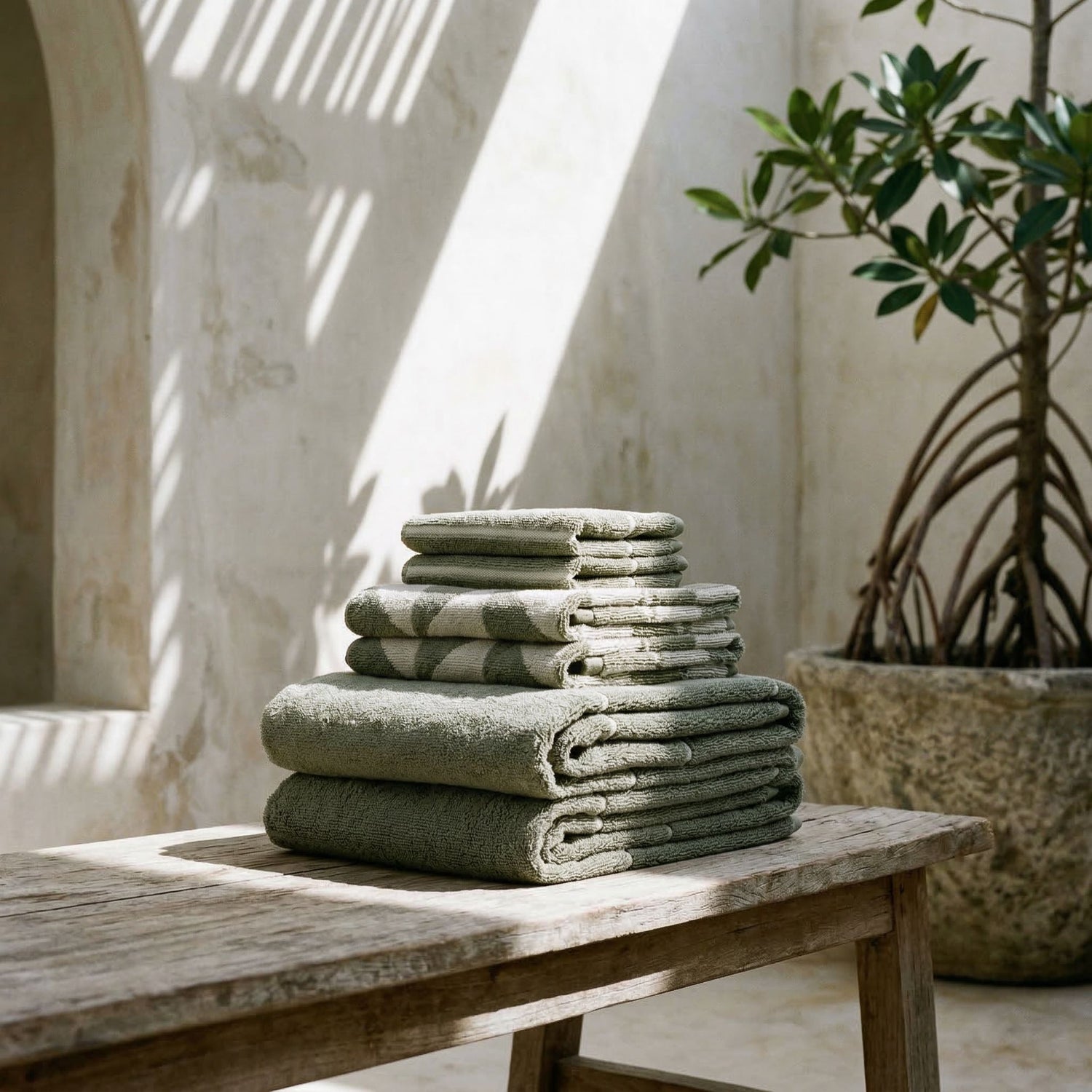 Italic Umbra Australian Cotton Bath Towels in a standard set, shown in a stylish home bathroom setting.