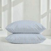 Elegant Luxe Australian Sateen pillowcase set by Italic, featuring smooth, shiny fabric for a luxurious bedroom look.