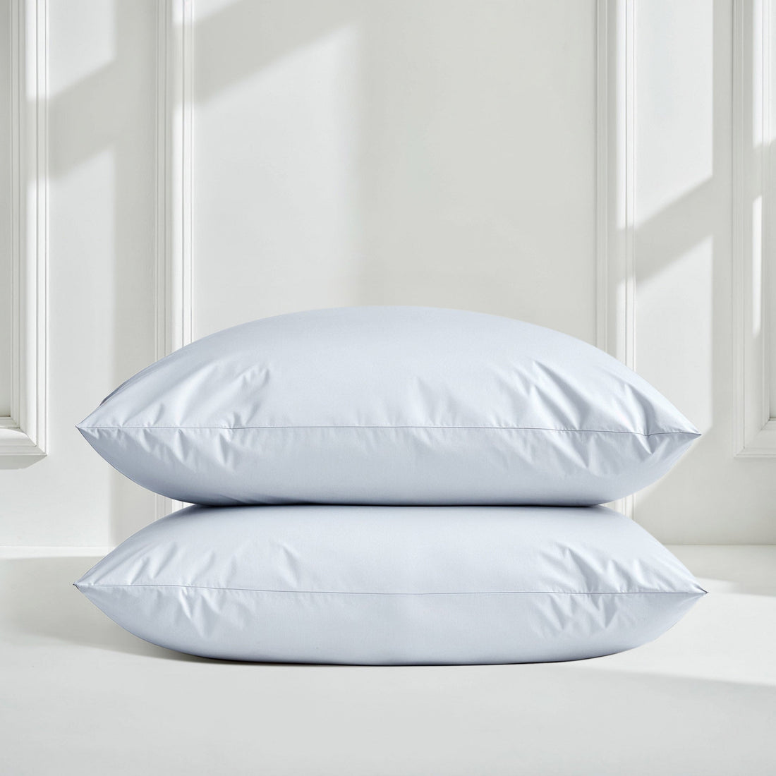 Soft white Luxe Australian Sateen Sheet Set from Italic, featuring smooth, luxurious bed sheets with a silky finish.