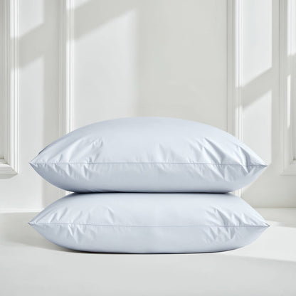 Soft white Luxe Australian Sateen Sheet Set from Italic, featuring smooth, luxurious bed sheets with a silky finish.