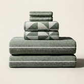 Set of Deia Australian cotton towels from Italic, soft and plush, displayed in a neutral color for home bed or bath use.