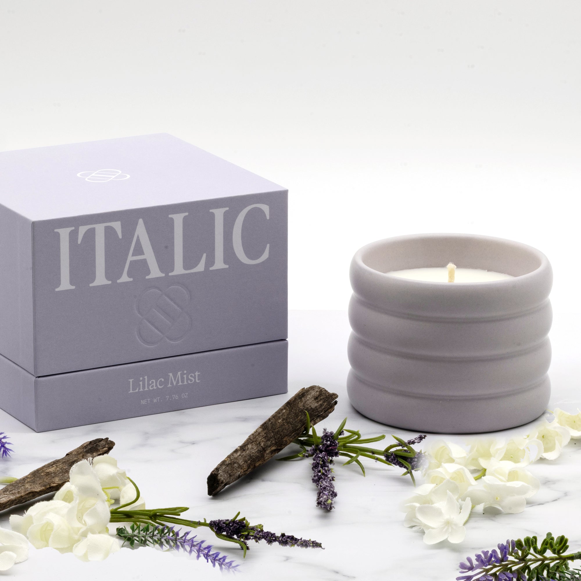 Lilac soy wax ceramic candle by Italic in a smooth ceramic holder, showcasing a cozy and elegant home decor accent.