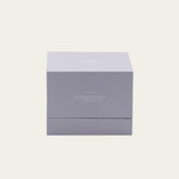 Lavender-colored ceramic candle holder with a soy wax candle from Italic, showcasing a smooth, glazed finish and elegant design.
