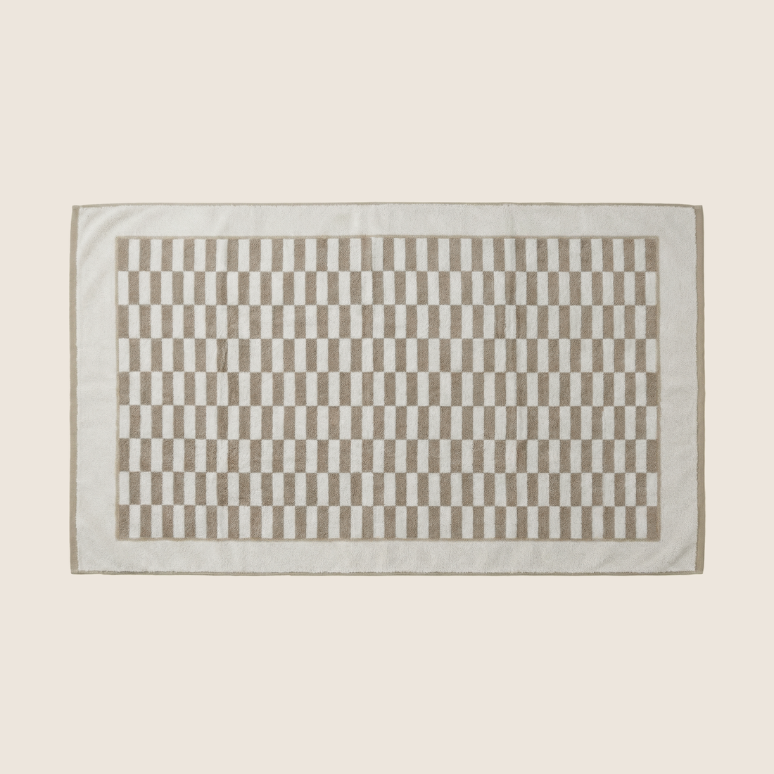 Italic Pietra Australian Cotton Towels flatlay with folded and draped towels showcasing soft, plush texture and neutral tones.