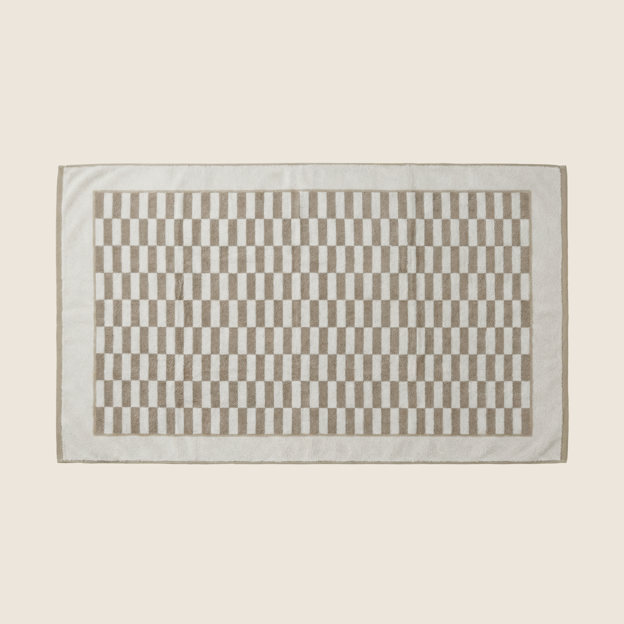 Italic Pietra Australian Cotton Towels flatlay with folded and draped towels showcasing soft, plush texture and neutral tones.