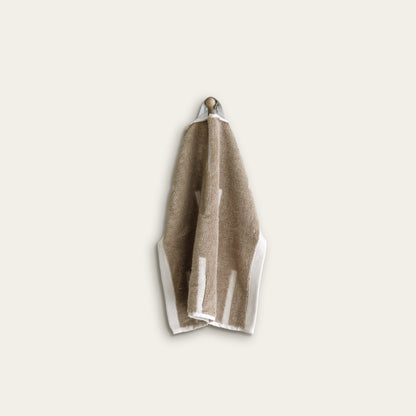 Soft Sorrel Australian cotton washcloth from Italic, featuring plush texture and natural white color for gentle skincare.