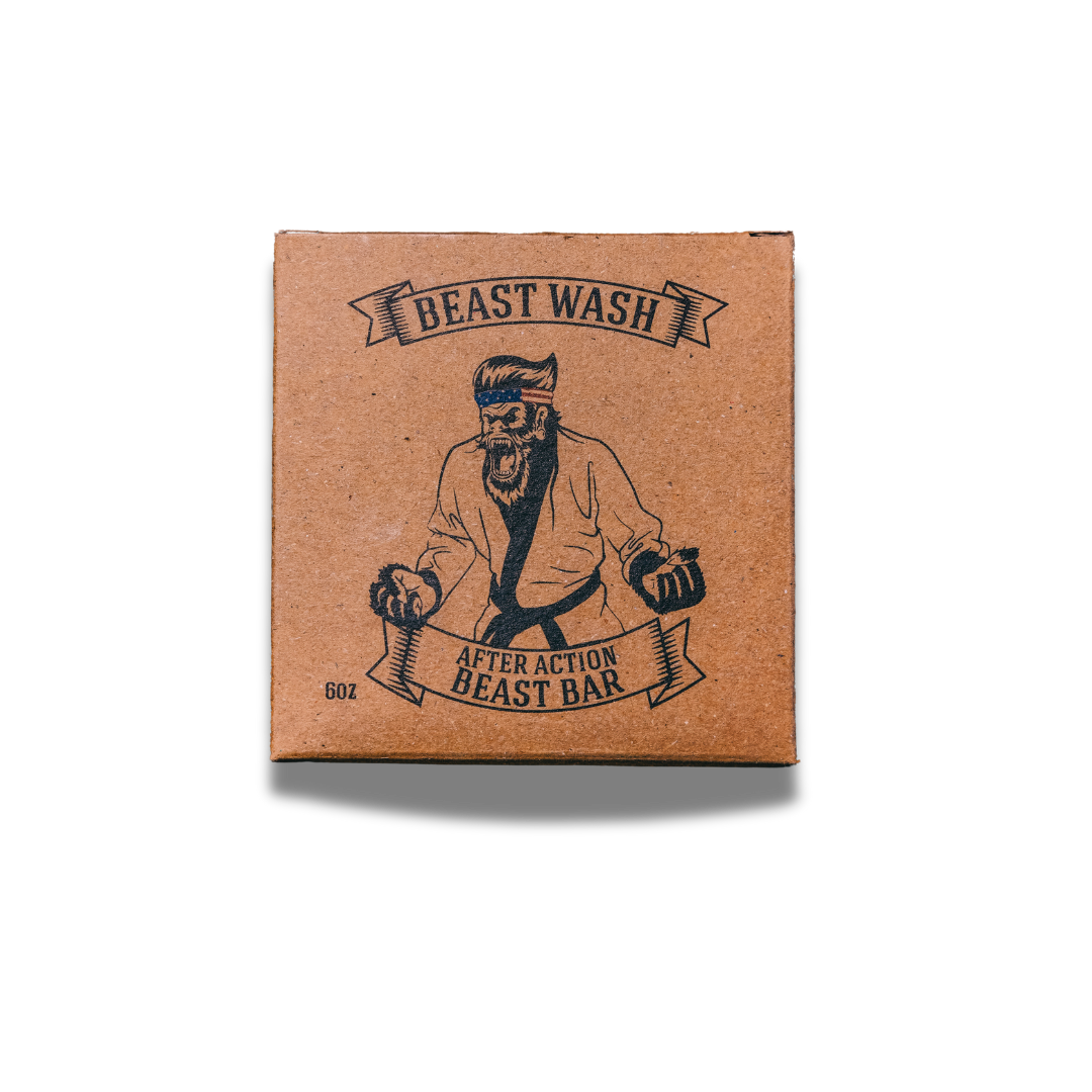 Johnny Slicks After Action Beast Bar soap showing a natural, rustic soap bar with a textured surface and branding label.