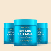 Maree Keratin Hair Mask for damaged hair, creamy treatment in a jar with smooth texture and applied to hair strands.