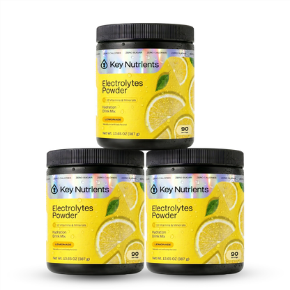 Key Nutrients Electrolyte Recovery Plus Powder in lemonade flavor, sugar-free electrolyte mix with lemon slices and powder in a container.