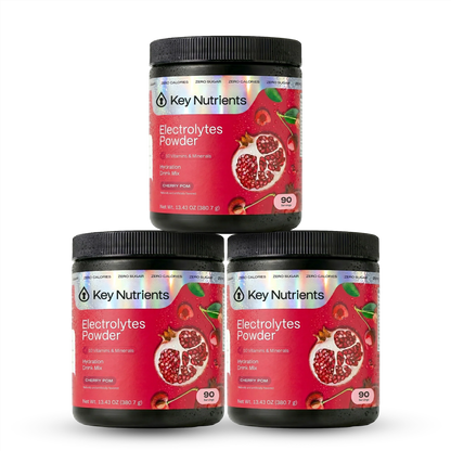 Cherry and pomegranate flavored Key Nutrients Electrolyte Recovery Plus Powder, sugar-free supplement with vibrant fruit imagery.