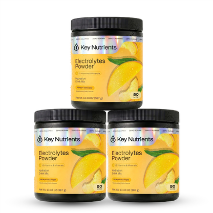 Peach and mango flavored Key Nutrients Electrolyte Recovery Plus Powder, sugar-free electrolyte supplement in a scoop.