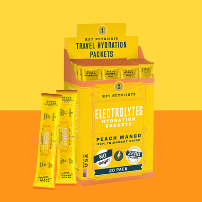 Peach mango flavored electrolyte recovery powder by Key Nutrients in a 20-pack, sugar-free formula for hydration and replenishment.