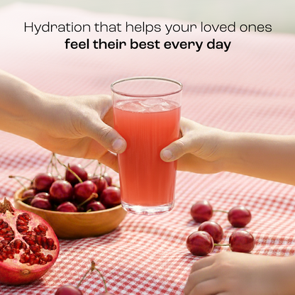 Key Nutrients Electrolyte Recovery Plus Powder in a clear container, with a scoop and a glass of water on a bright, active lifestyle background.