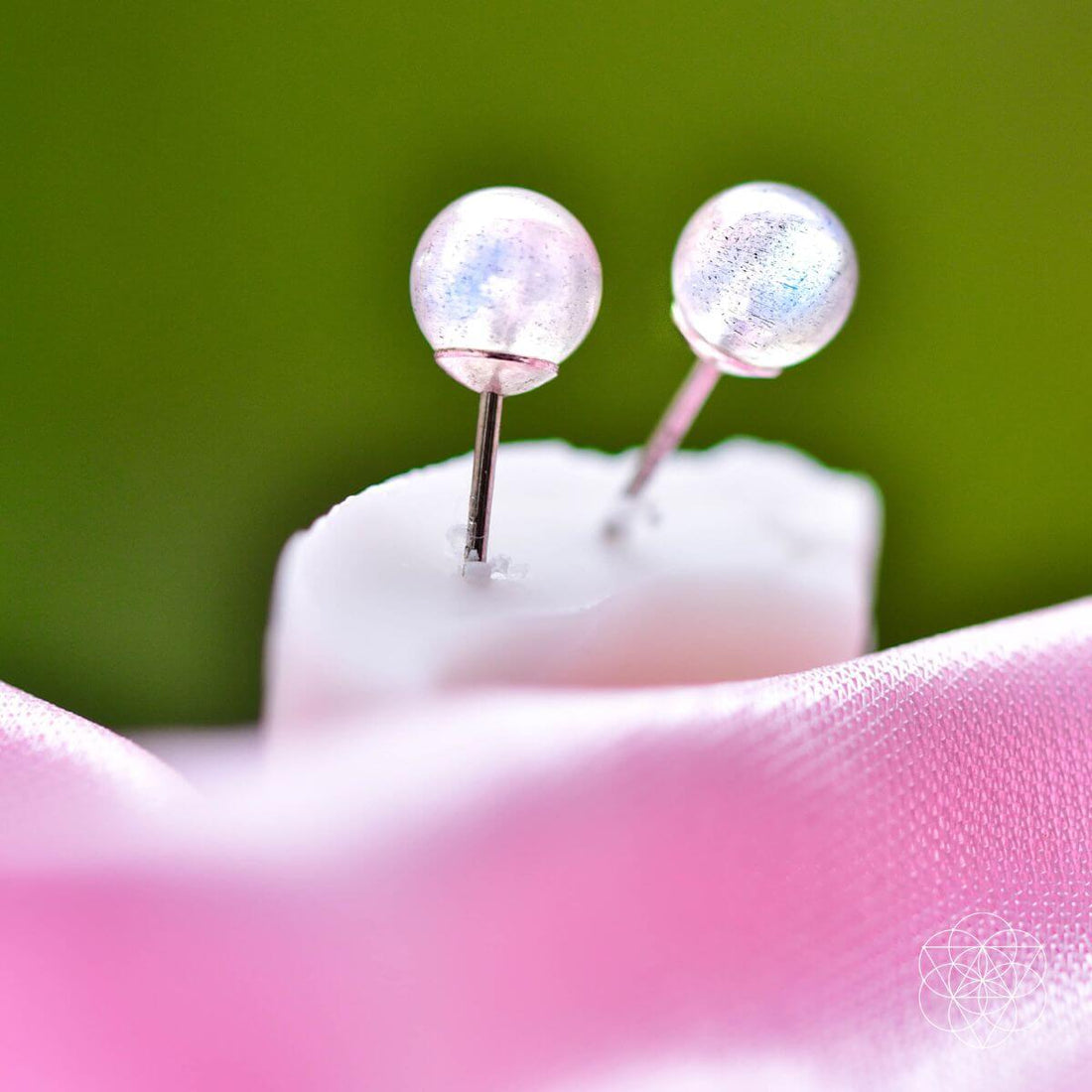 Conscious Items Labradorite Stabilization Earrings featuring polished labradorite stones on silver hooks.