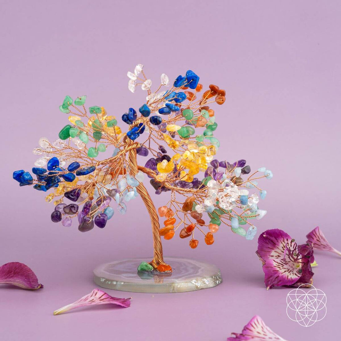 Crystal tree sculpture with colorful chakra stones representing Feng Shui energy, designed for harmony and positive vibes.