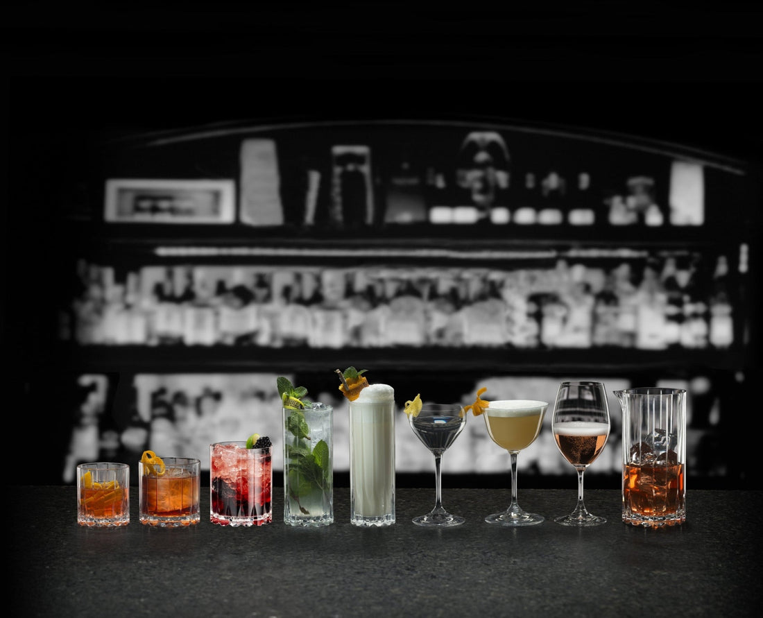 Two-pack of Liquor Geeks Riedel Drink Specific Rocks Glassware, clear barware glasses for spirits and cocktails on a white background.