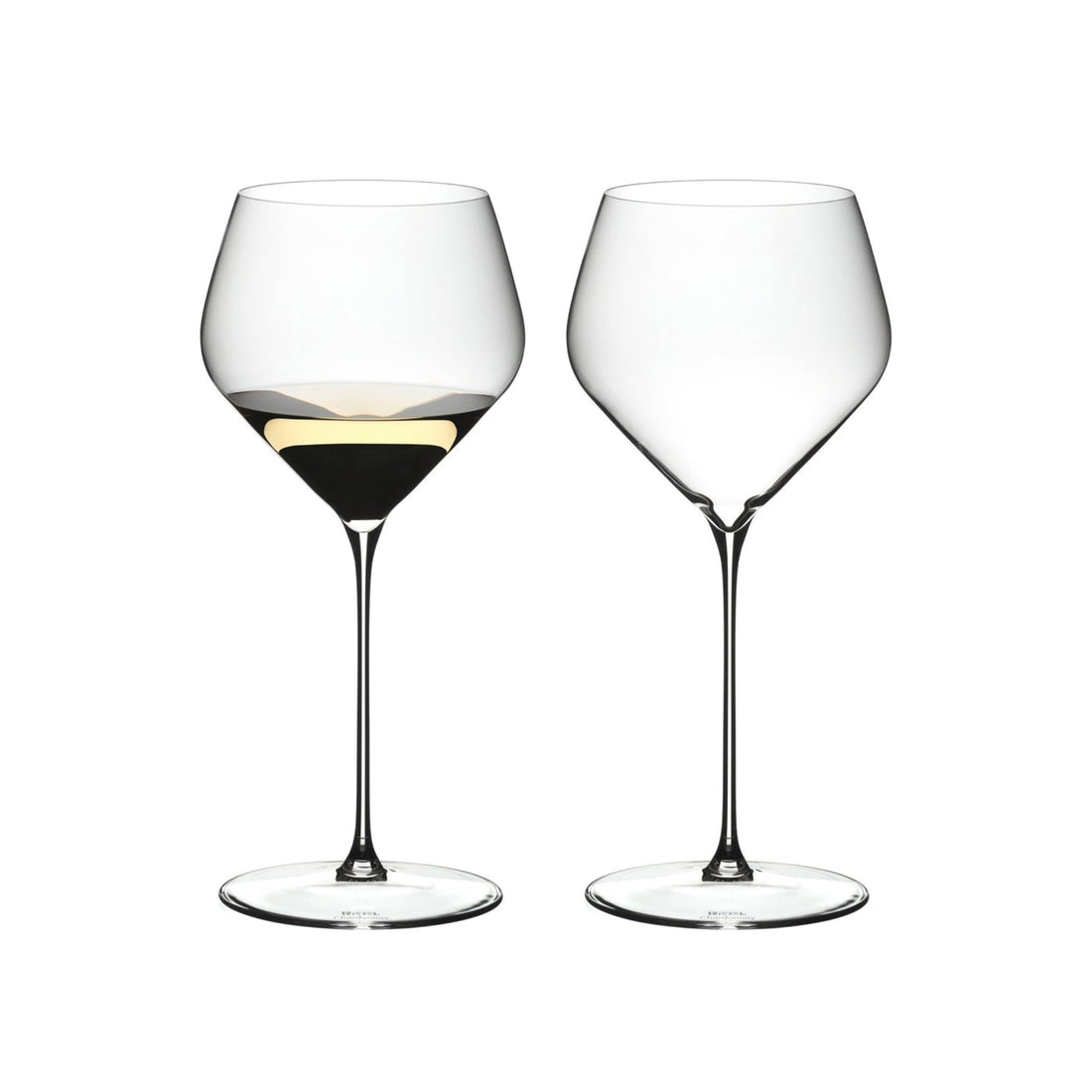 Set of 2 Riedel Veloce Chardonnay glasses for wine tasting, clear barware with elegant bowl and stem design.