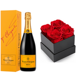 Veuve Clicquot Brut champagne gift set with a decorative flower, presented by Liquor Geeks, perfect for special celebrations.
