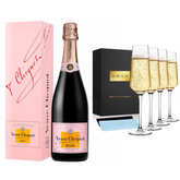Veuve Clicquot Rosé champagne with four glasses in a gift set, presented by Liquor Geeks, ideal for celebratory occasions