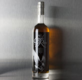 Bottle of Eagle Rare 10 Year Kentucky Straight Bourbon Whiskey from Liquor Geeks, with distinctive label and amber liquid inside.