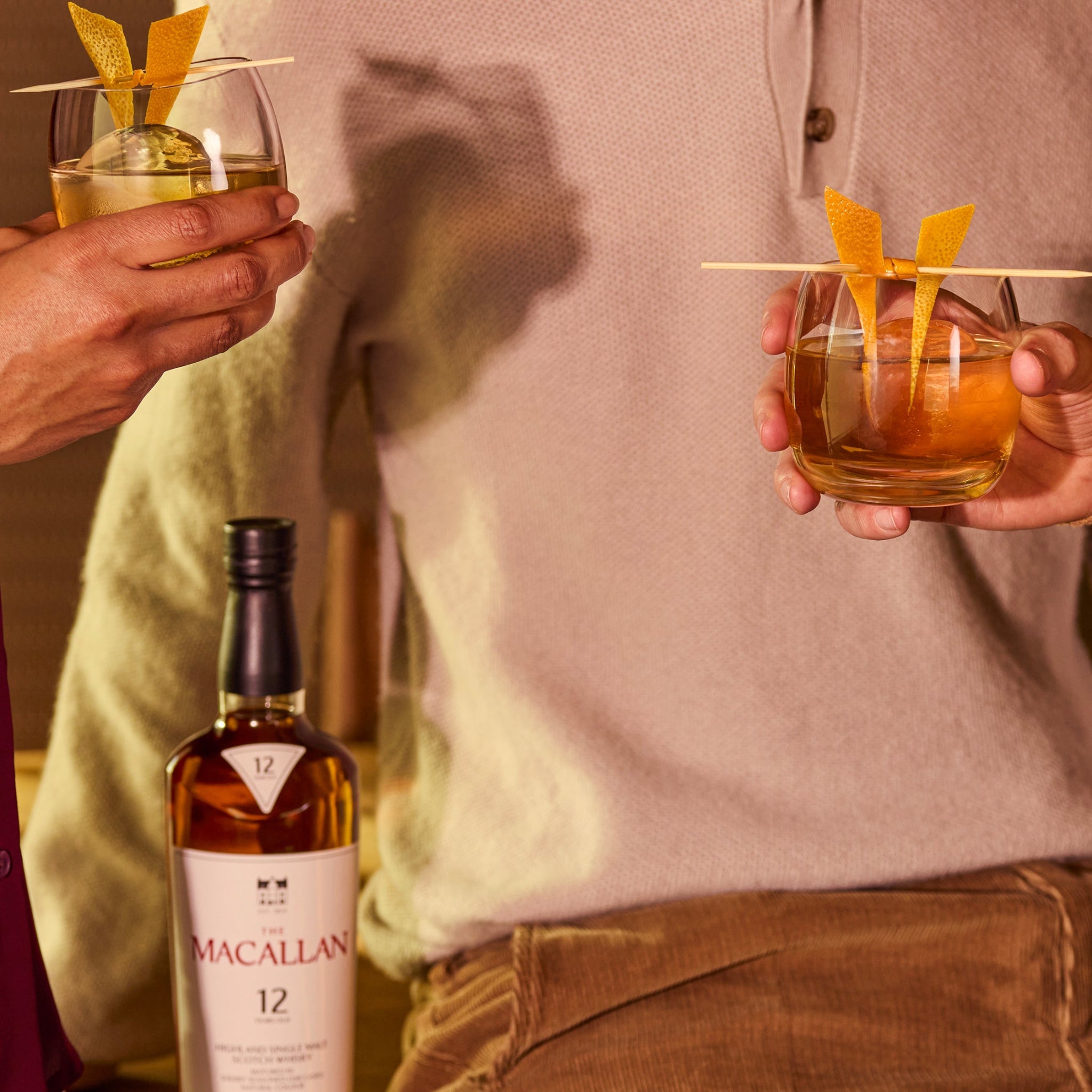 Bottle of The Macallan 12 Year Old Double Cask Single Malt Scotch Whiskey in clear glass with label details