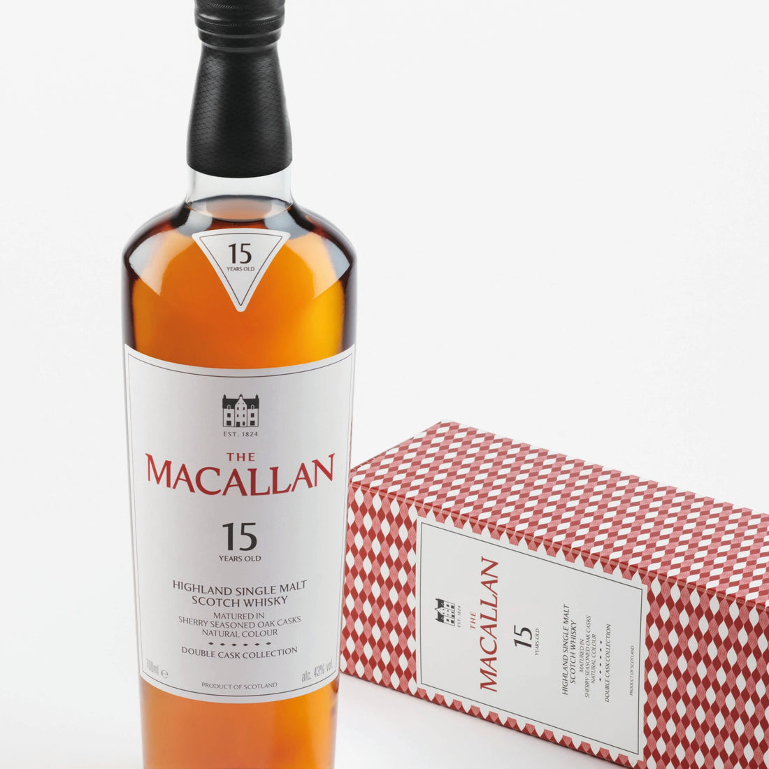 Bottle of The Macallan Double Cask 15 Years Old Single Malt Scotch Whiskey, 750ml, with a dark amber liquid in a branded bottle.
