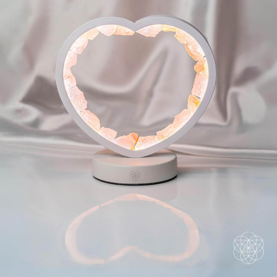 Rose quartz heart lamp night light by Conscious Items featuring a love magnet design and soft glowing illumination.
