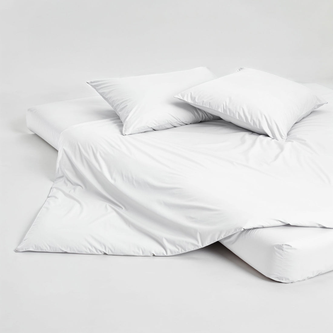 White Luxe Australian Sateen Pillowcase Set by Italic, soft and smooth bed pillowcases with a luxurious sheen.