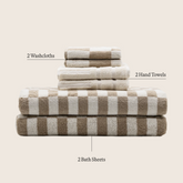 Set of five luxe Pietra Australian cotton towels in various sizes, soft and absorbent, by Italic.